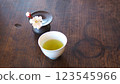 A vase of plum blossoms and tea 123545966
