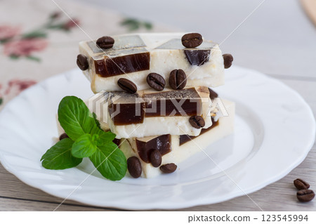 coffee jelly pieces inside white milk jelly coffee jelly pieces inside white milk jelly 123545994