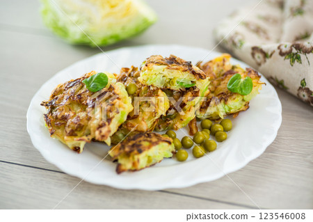 vegetable cabbage pancakes on a wooden table 123546008