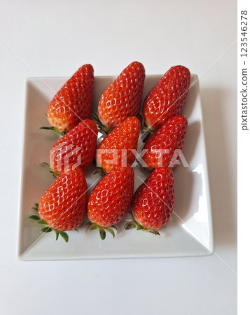 Strawberries served in white dishes Strawberries served in white dishes 123546278