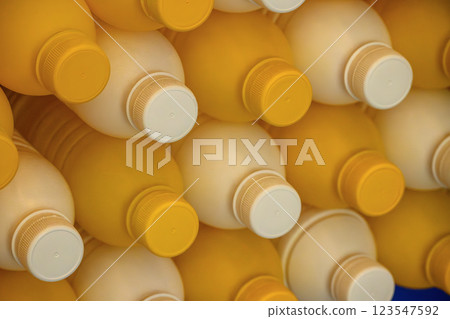 The group of orange plastic bottles container. The group of orange plastic bottles container. 123547592