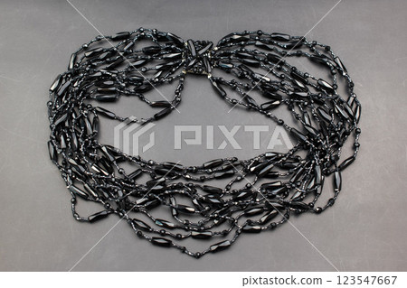 Unique necklace for women on a black background, promotional photo for an online vintage and handmade jewelry store Unique necklace for women on a black background, promotional photo for an online vintage and handmade jewelry store 123547667