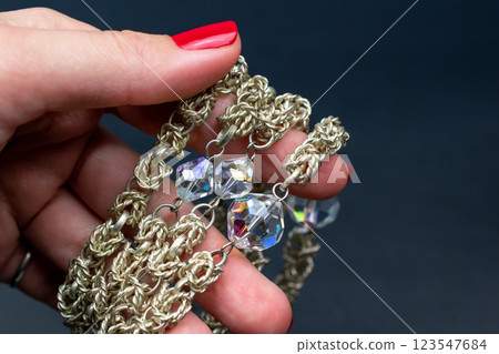 Unique necklace for women on a black background, promotional photo for an online vintage and handmade jewelry store Unique necklace for women on a black background, promotional photo for an online vintage and handmade jewelry store 123547684