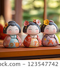 Female doll wearing a kimono 123547742