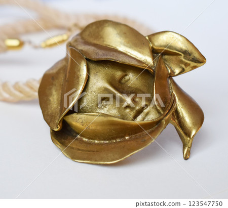 Unique necklace for women on a white background, promotional photo for an online vintage and handmade jewelry store Unique necklace for women on a white background, promotional photo for an online vintage and handmade jewelry store 123547750