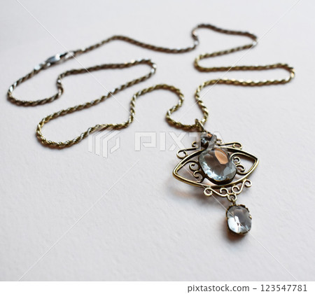 Unique necklace for women on a white background, promotional photo for an online vintage and handmade jewelry store 123547781