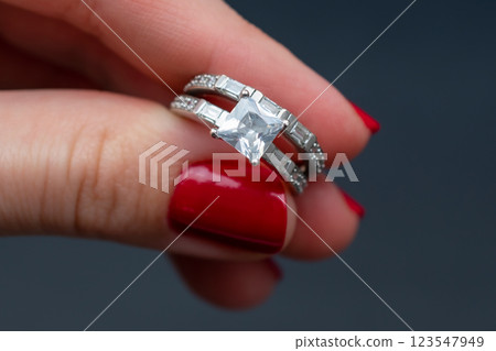 Statement ring for women on a black background, fine jewelry concept,  promotional photo for an online vintage and handmade jewelry store 123547949