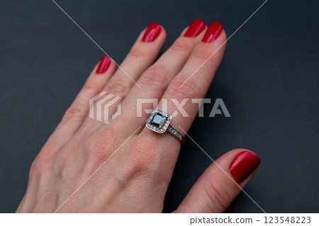 Statement ring for women on a black background, fine jewelry concept, promotional photo for an online vintage and handmade jewelry store Statement ring for women on a black background, fine jewelry concept, promotional photo for an online vintage and handmade jewelry store 123548223