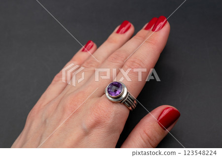 Statement ring for women on a black background, fine jewelry concept,  promotional photo for an online vintage and handmade jewelry store 123548224