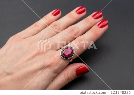 Statement ring for women on a black background, fine jewelry concept,  promotional photo for an online vintage and handmade jewelry store 123548225