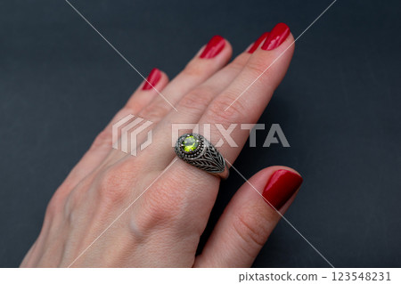 Statement ring for women on a black background, fine jewelry concept, promotional photo for an online vintage and handmade jewelry store Statement ring for women on a black background, fine jewelry concept, promotional photo for an online vintage and handmade jewelry store 123548231