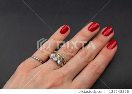 Statement ring for women on a black background, fine jewelry concept,  promotional photo for an online vintage and handmade jewelry store 123548236