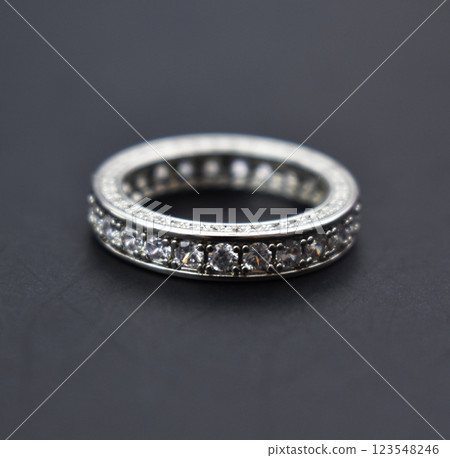 Statement ring for women on a black background, fine jewelry concept, promotional photo for an online vintage and handmade jewelry store Statement ring for women on a black background, fine jewelry concept, promotional photo for an online vintage and handmade jewelry store 123548246