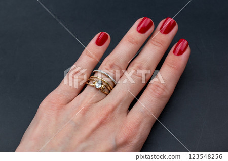 Statement ring for women on a black background, fine jewelry concept, promotional photo for an online vintage and handmade jewelry store Statement ring for women on a black background, fine jewelry concept, promotional photo for an online vintage and handmade jewelry store 123548256