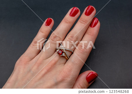 Statement ring for women on a black background, fine jewelry concept,  promotional photo for an online vintage and handmade jewelry store 123548268