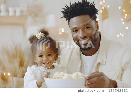 Celebrating the color of the year 2025 with a joyful father and daughter in a cozy kitchen 123548581