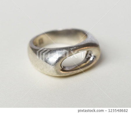 Statement ring for women on a white background, fine jewelry concept,  promotional photo for an online vintage and handmade jewelry store 123548682