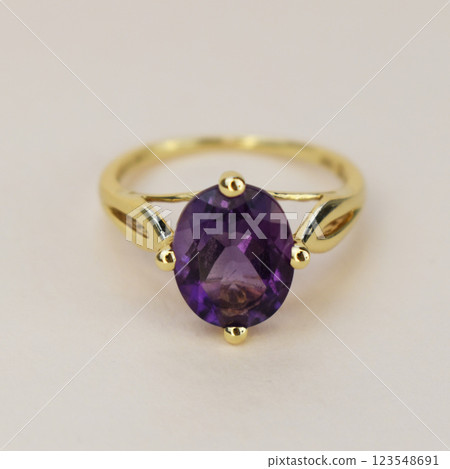 Statement ring for women on a white background, fine jewelry concept,  promotional photo for an online vintage and handmade jewelry store 123548691