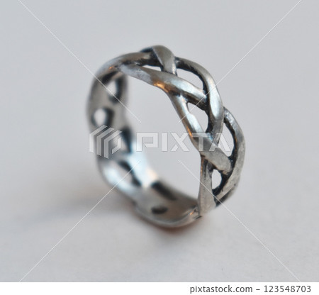 Statement ring for women on a white background, fine jewelry concept, promotional photo for an online vintage and handmade jewelry store Statement ring for women on a white background, fine jewelry concept, promotional photo for an online vintage and handmade jewelry store 123548703