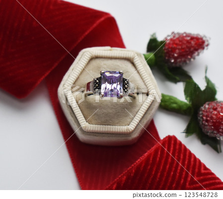 Statement ring for women on a white background, fine jewelry concept,  promotional photo for an online vintage and handmade jewelry store 123548728