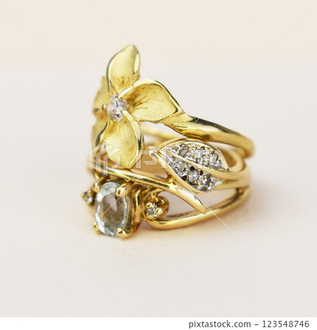 Statement ring for women on a white background, fine jewelry concept, promotional photo for an online vintage and handmade jewelry store Statement ring for women on a white background, fine jewelry concept, promotional photo for an online vintage and handmade jewelry store 123548746
