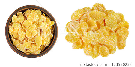 Cornflakes in ceramic bowl isolated on white background. Top view. Flat lay 123550235