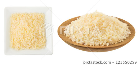 grated parmesan cheese in ceramic and wooden bowl isolated on white background. Top view. Flat lay 123550259