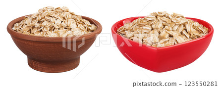 Oat flakes in brown ceramic bowl isolated on white background with full depth of field 123550281