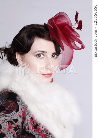 Glam brunette woman in red hat retro style fashion beauty portrait 123550656