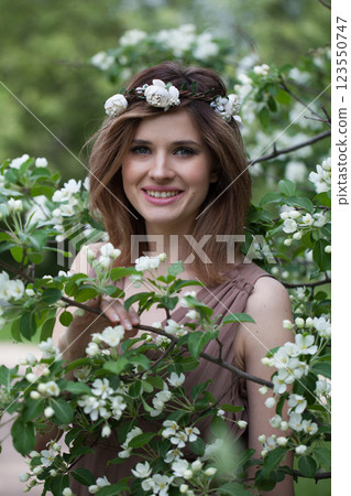 Happy fashion model outdoors portrait. Healthy beauty woman 123550747