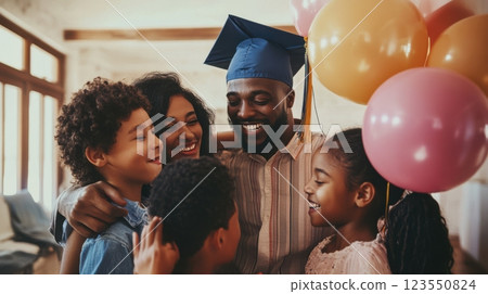 Proud family celebrating a graduate's achievement with hugs, smiles, and festive decor in a cozy home setting, capturing joy and support. 123550824