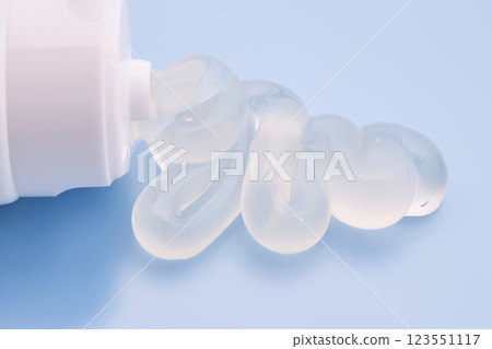 Gel toothpaste in a tube on a blue background. Gel toothpaste in a tube on a blue background. 123551117