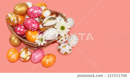 Decorated golden and pink eggs on a trendy pastel background. Minimal holiday concept. Happy Easter background, place for text, postcard, banner for the screen. 123551706