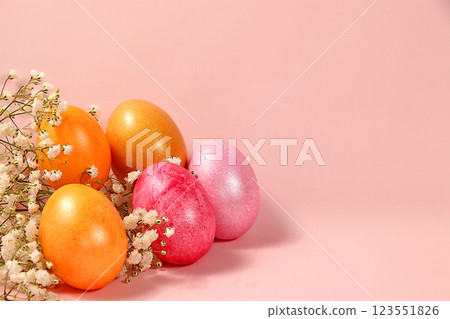 Happy Easter concept, banner for screen with place for congratulations, composition with decorated pink and gold Easter eggs and flowers, template for design. spring card, selective focus Happy Easter concept, banner for screen with place for congratulations, composition with decorated pink and gold Easter eggs and flowers, template for design. spring card, selective focus 123551826