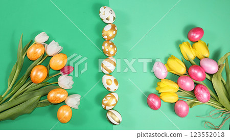 Decorated golden easter eggs on trendy green background. Minimal holiday concept. Happy Easter background, place for text, postcard, banner for the screen. 123552018
