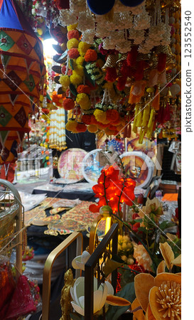 Asian hand made souvenirs made with local craftsman and being sold at the market in souvenir shop in Singapore 123552540