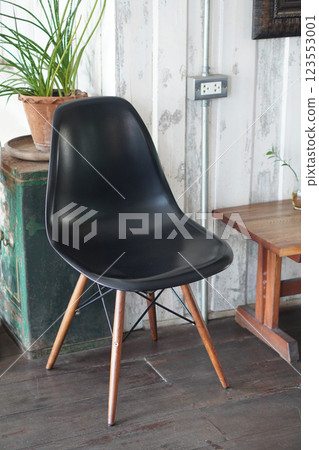 old black wooden chair on wooden floor, white wall background, nature, object, decor, copy space 123553001