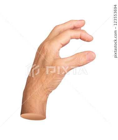 Elderly hand gripping an invisible object, fingers slightly curled in a natural grasp. Aged skin 123553694