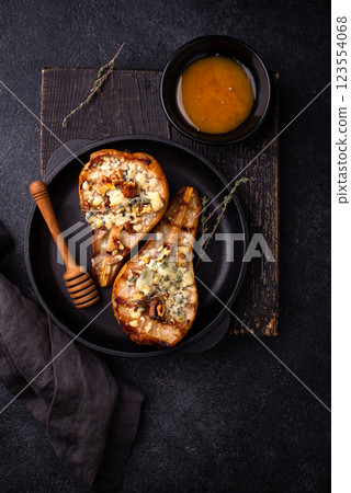 Baked pears with blue cheese and honey Baked pears with blue cheese and honey 123554068