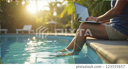 A person who sits as a digital nomad under palm trees in a tropical landscape by the pool and can work off his work worldwide 123555657