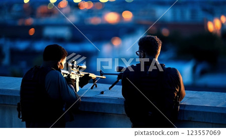 Police snipers aiming at their target on rooftop at dusk 123557069
