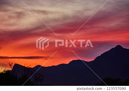 Sunset Over Nevada Mountains Silhouetted Peaks at Eye Level Perspective 123557090