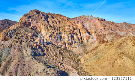 Aerial of Rugged Desert Mountains in Warm Hues Aerial of Rugged Desert Mountains in Warm Hues 123557111