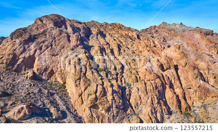 Aerial of Jagged Rocky Mountains and Desert Terrain in Nevada Aerial of Jagged Rocky Mountains and Desert Terrain in Nevada 123557215