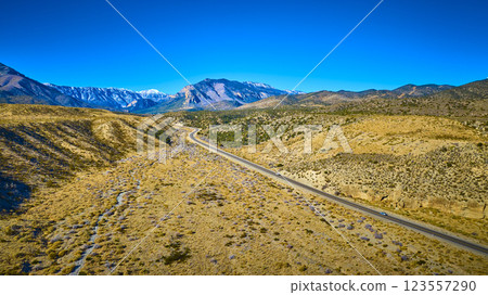 Aerial of Winding Road Through Nevada's Rugged Mountain Terrain Aerial of Winding Road Through Nevada's Rugged Mountain Terrain 123557290