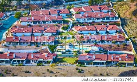 Aerial Suburban Desert Community with Tennis Courts in Grid Pattern Aerial Suburban Desert Community with Tennis Courts in Grid Pattern 123557443