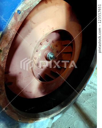 Detailed View of a Fan Blade Showcasing Intricate Design Within a Mechanical Environment Detailed View of a Fan Blade Showcasing Intricate Design Within a Mechanical Environment 123557651
