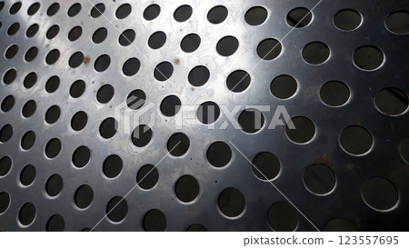 Stainless Steel Mesh Features Intricate Patterns and Showcases Durable Craftsmanship 123557695