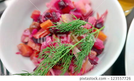 Vibrant Salad Bursting With Fresh Greens and Colorful Vegetables in a Bright Bowl 123557726
