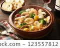Hot shrimp and scallop ajillo 123557812